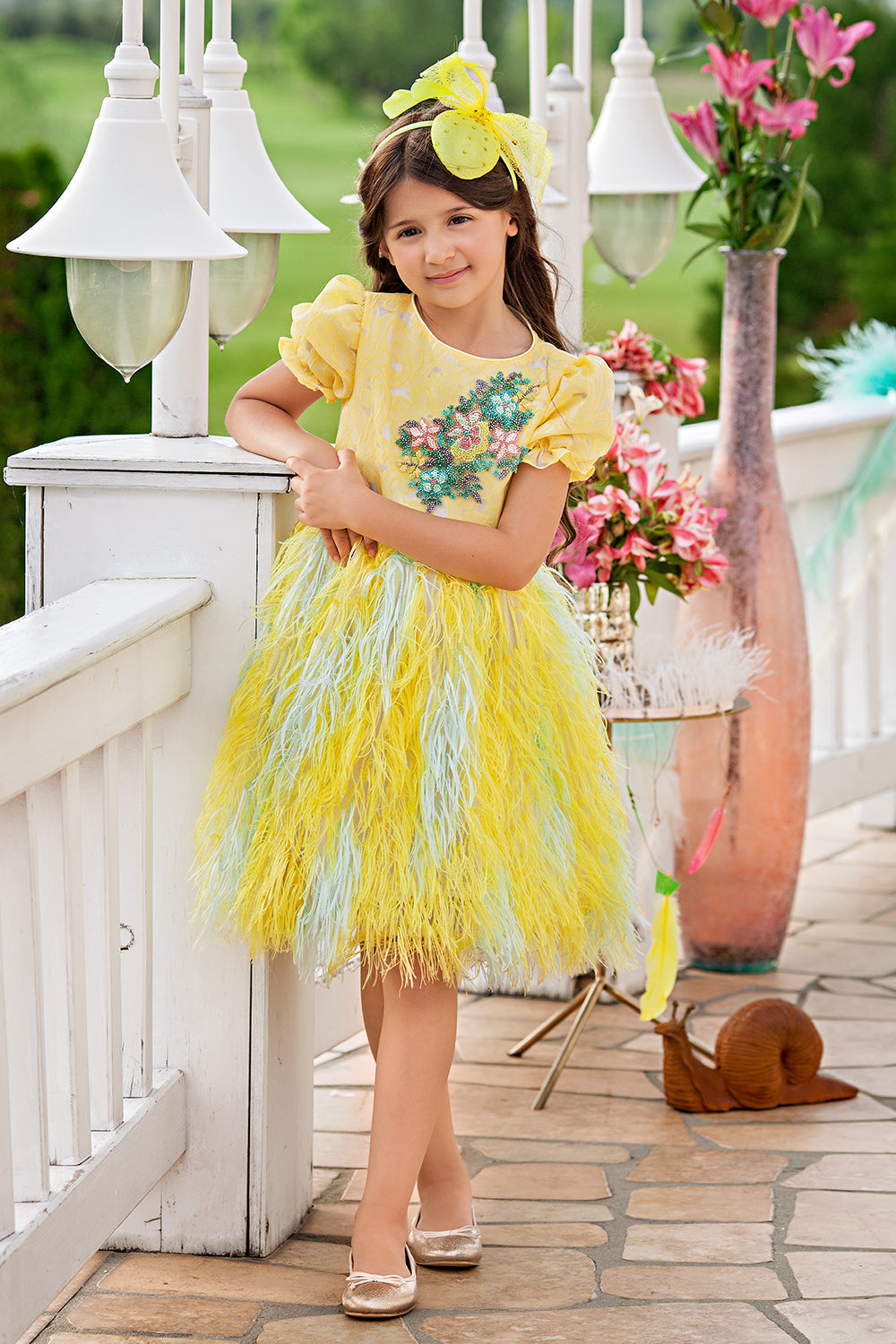 Yellow feather-like dress with hand-made embellishments