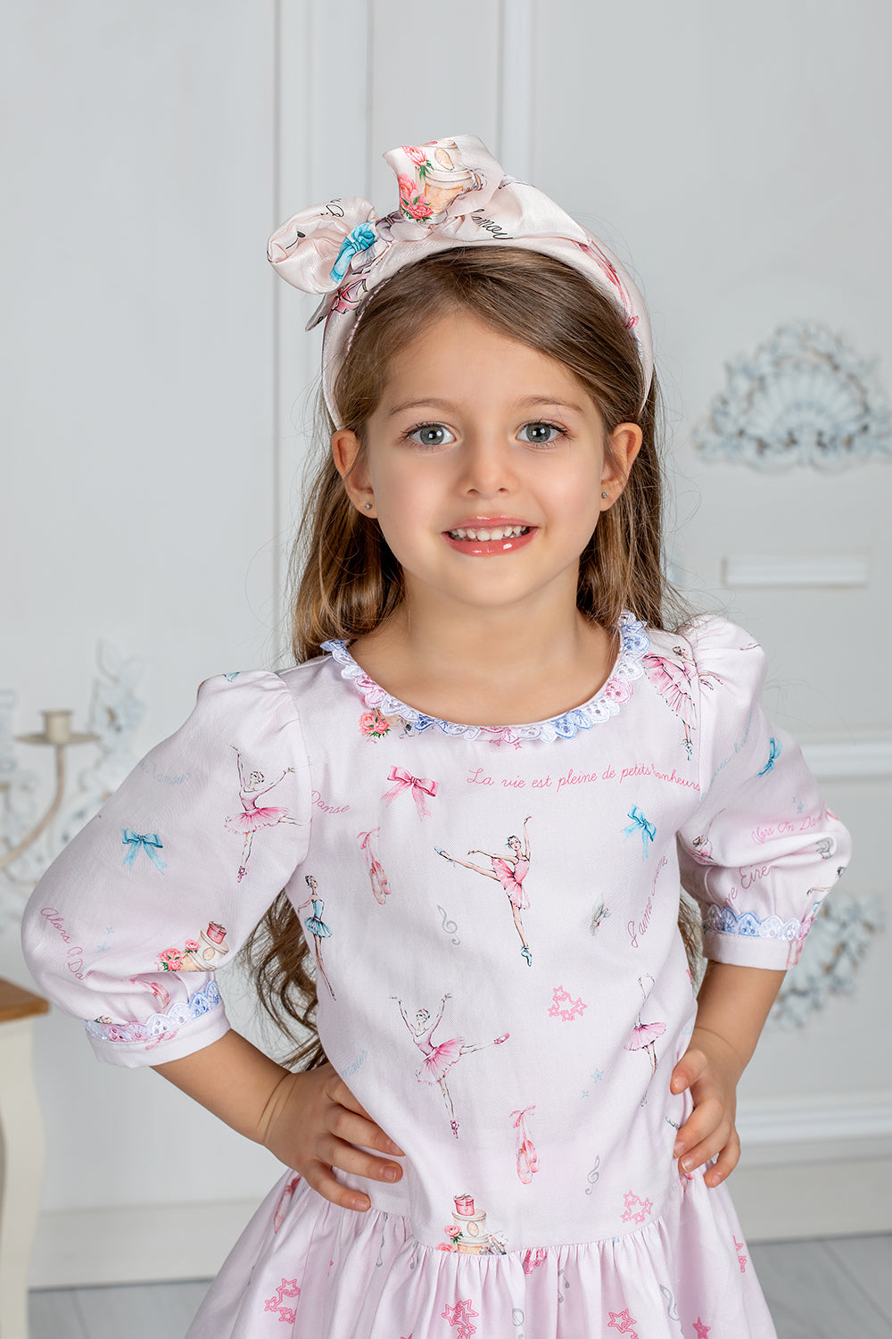 Pale pink cotton dress with ballet print