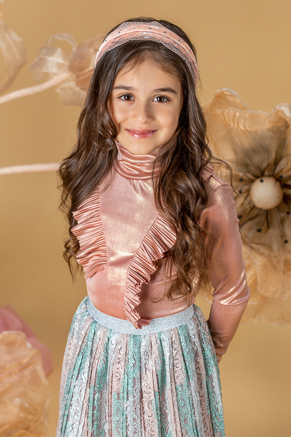 Shimmering rose gold turtleneck shirt with frills