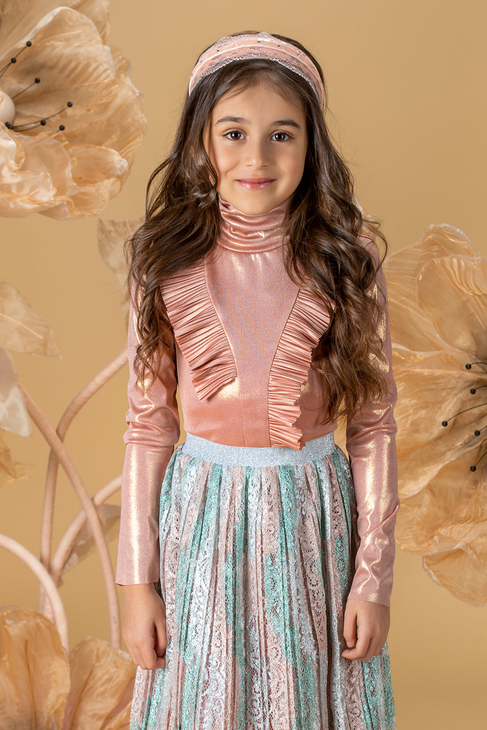 Shimmering rose gold turtleneck shirt with frills