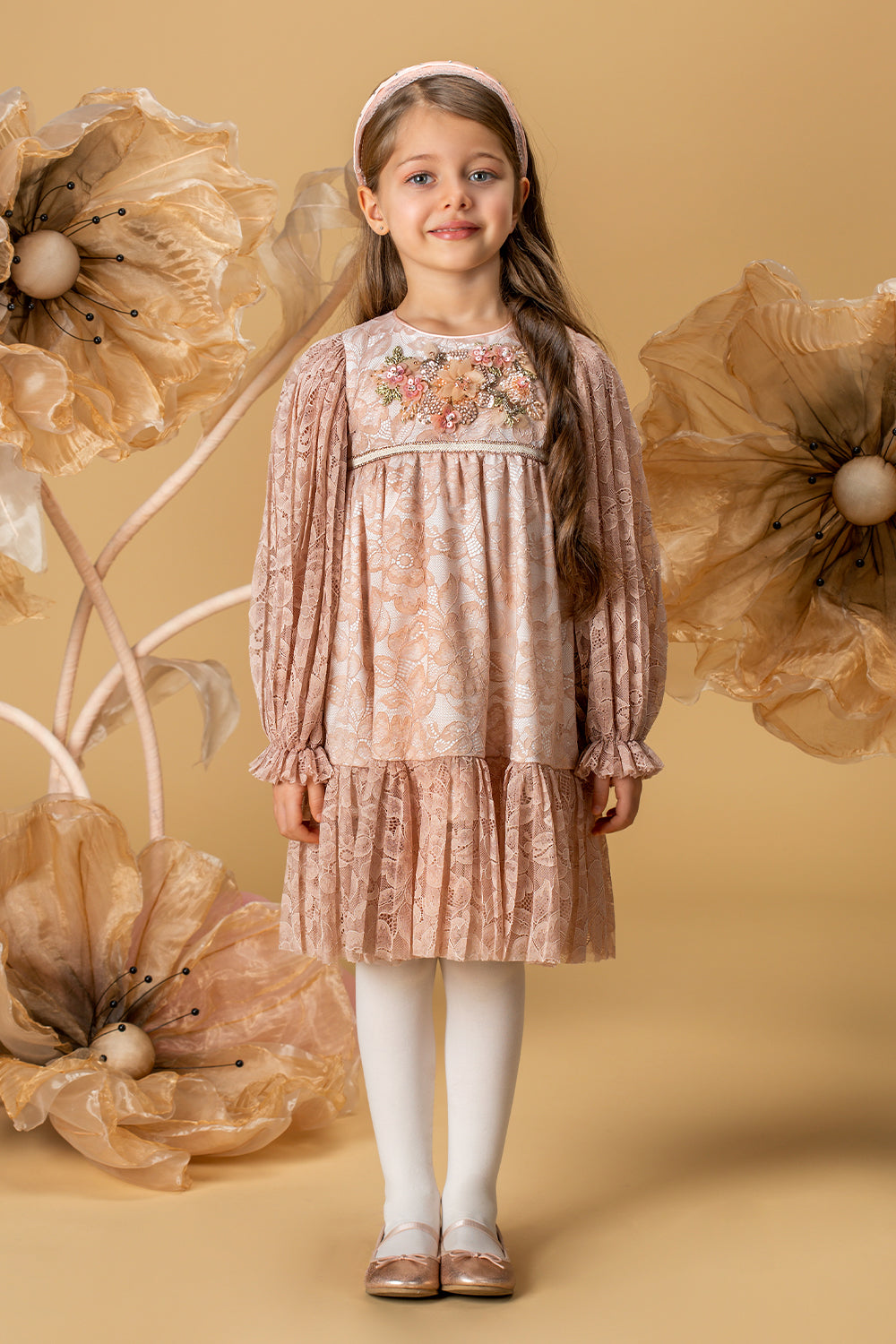 Pale pink pleated lace dress with a handmade embellishment