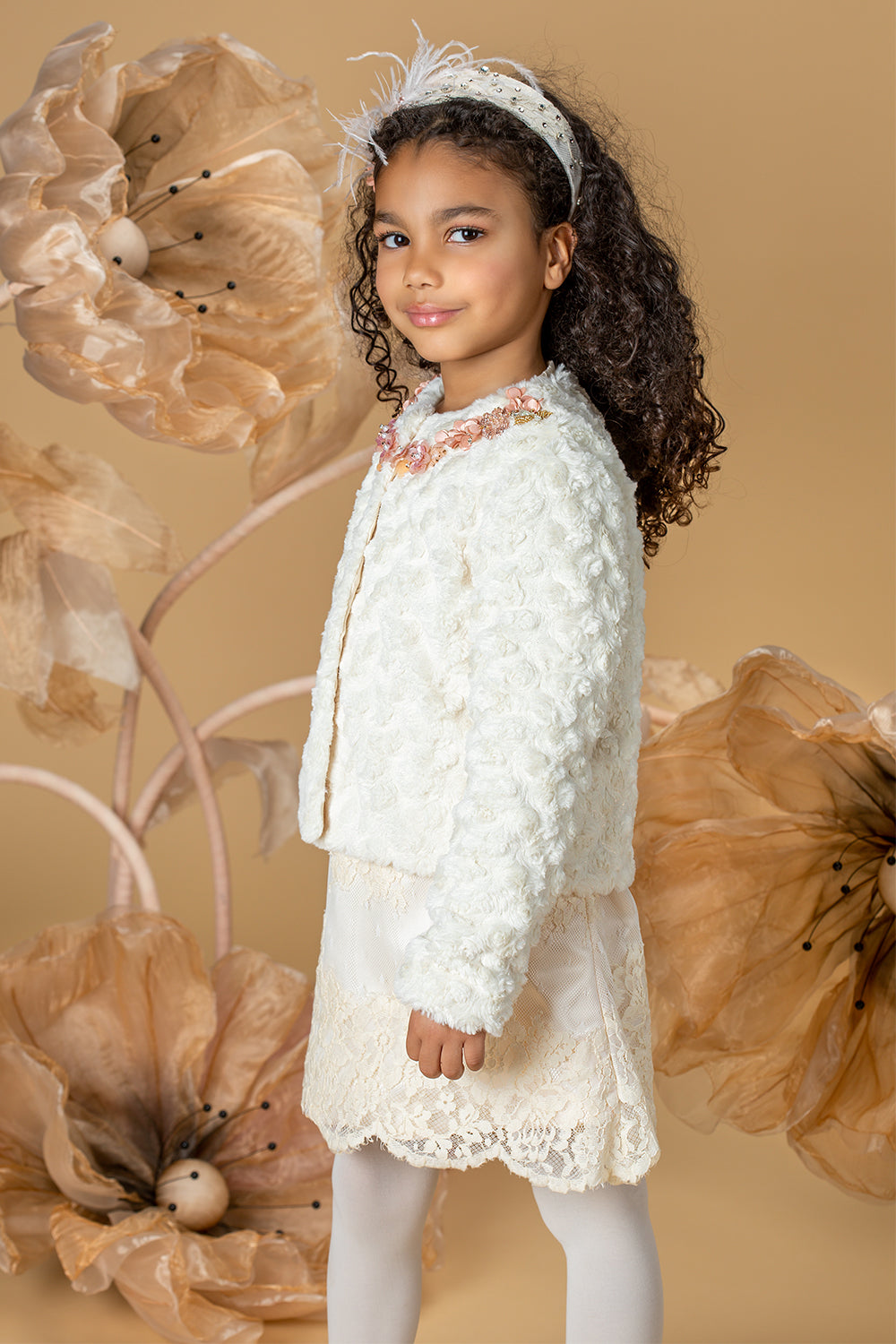 Off-white faux fur short coat with handmade embellishment