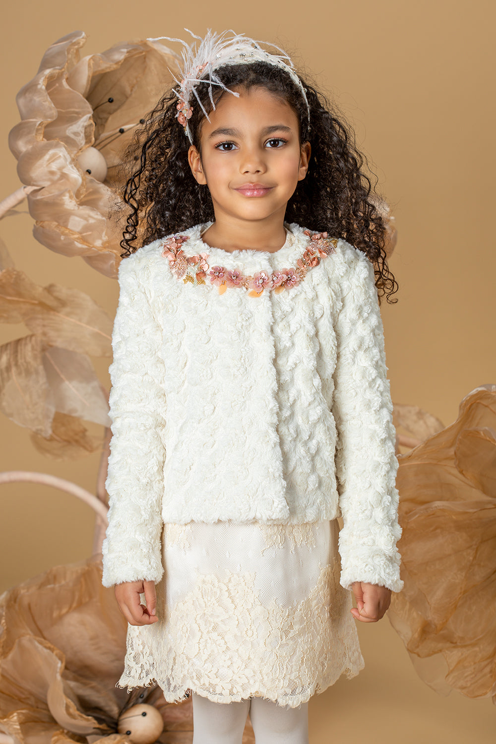 Off-white faux fur short coat with handmade embellishment