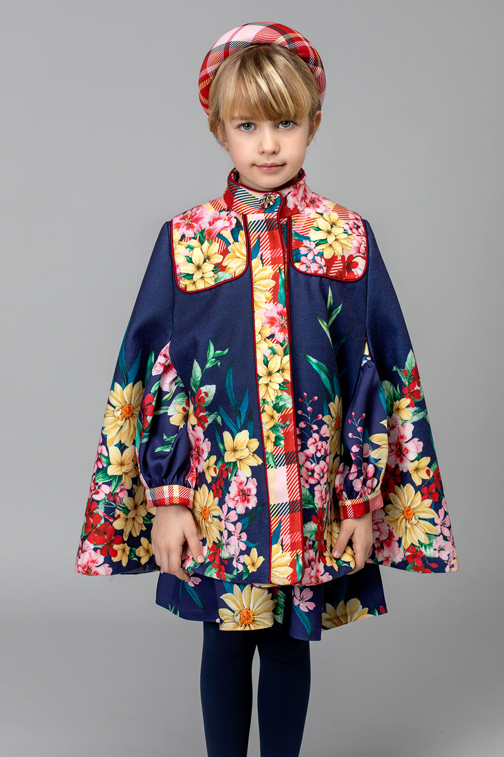 Blue floral printed flared cape with a jewel button