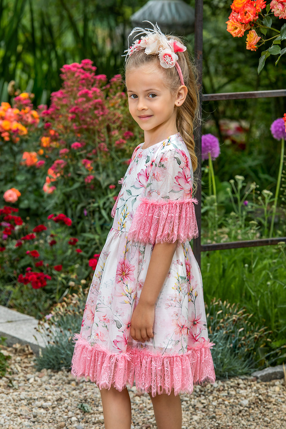White floral dress with pink lace details