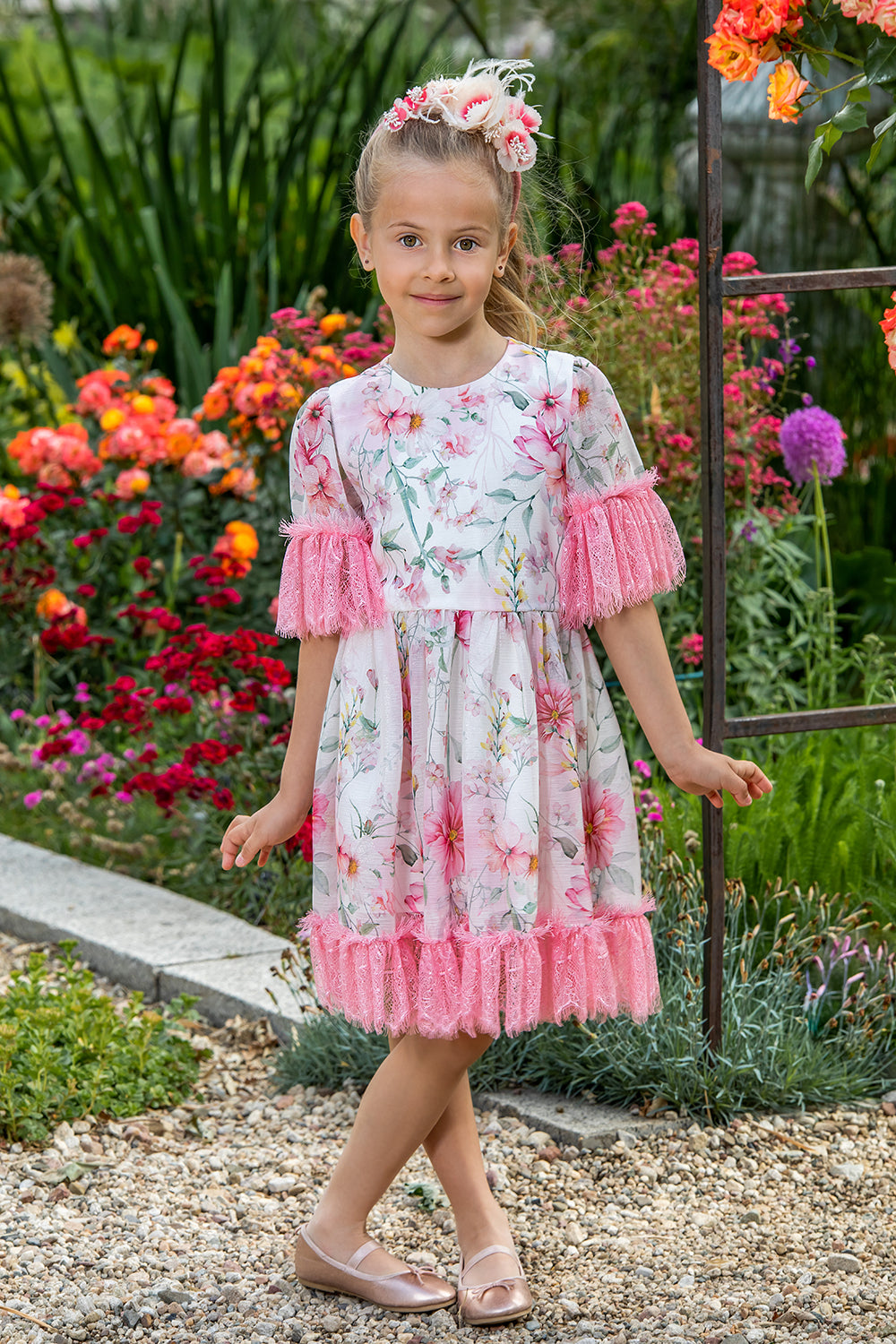 White floral dress with pink lace details