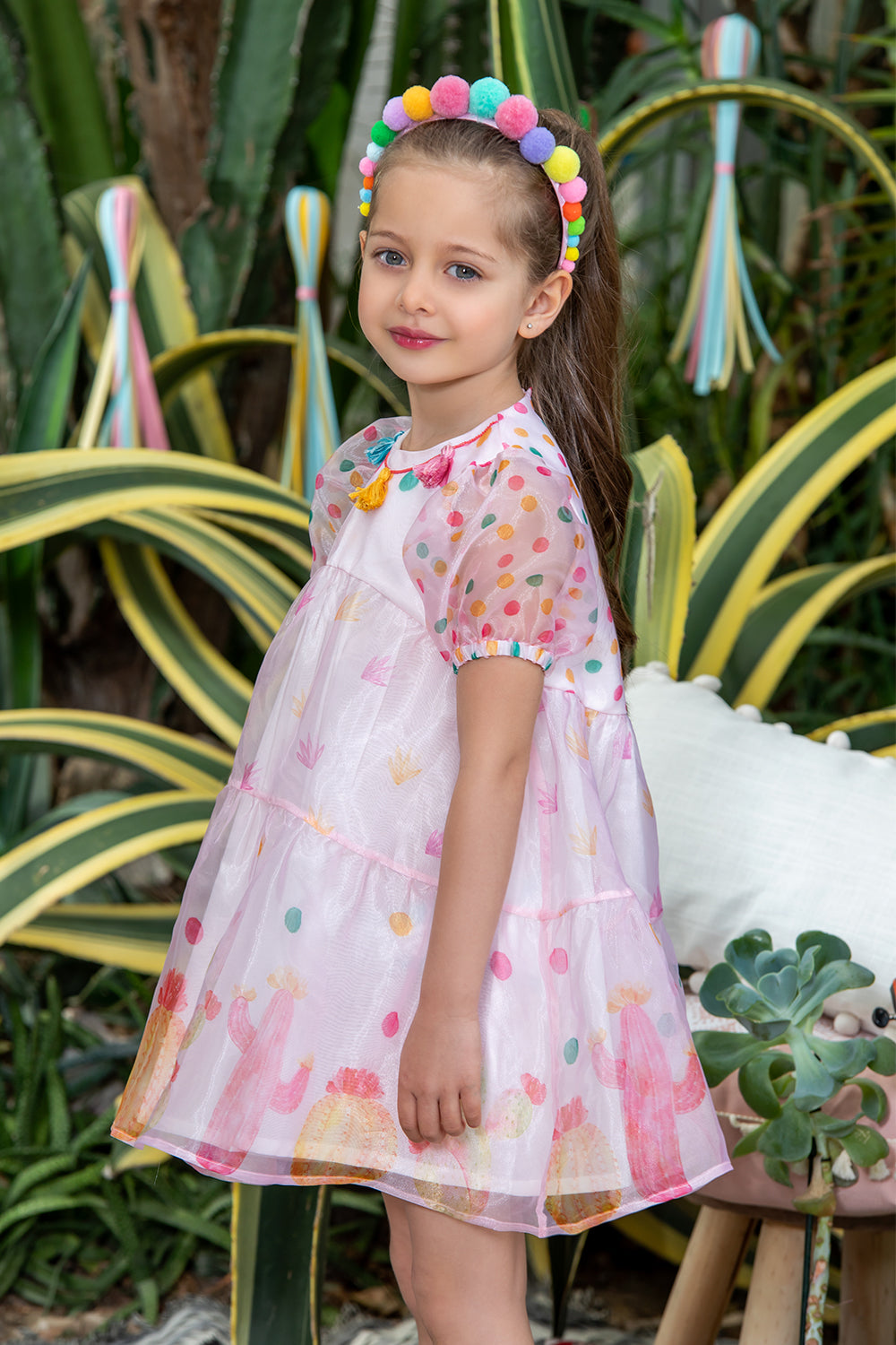 Light pink organza dress with pom poms