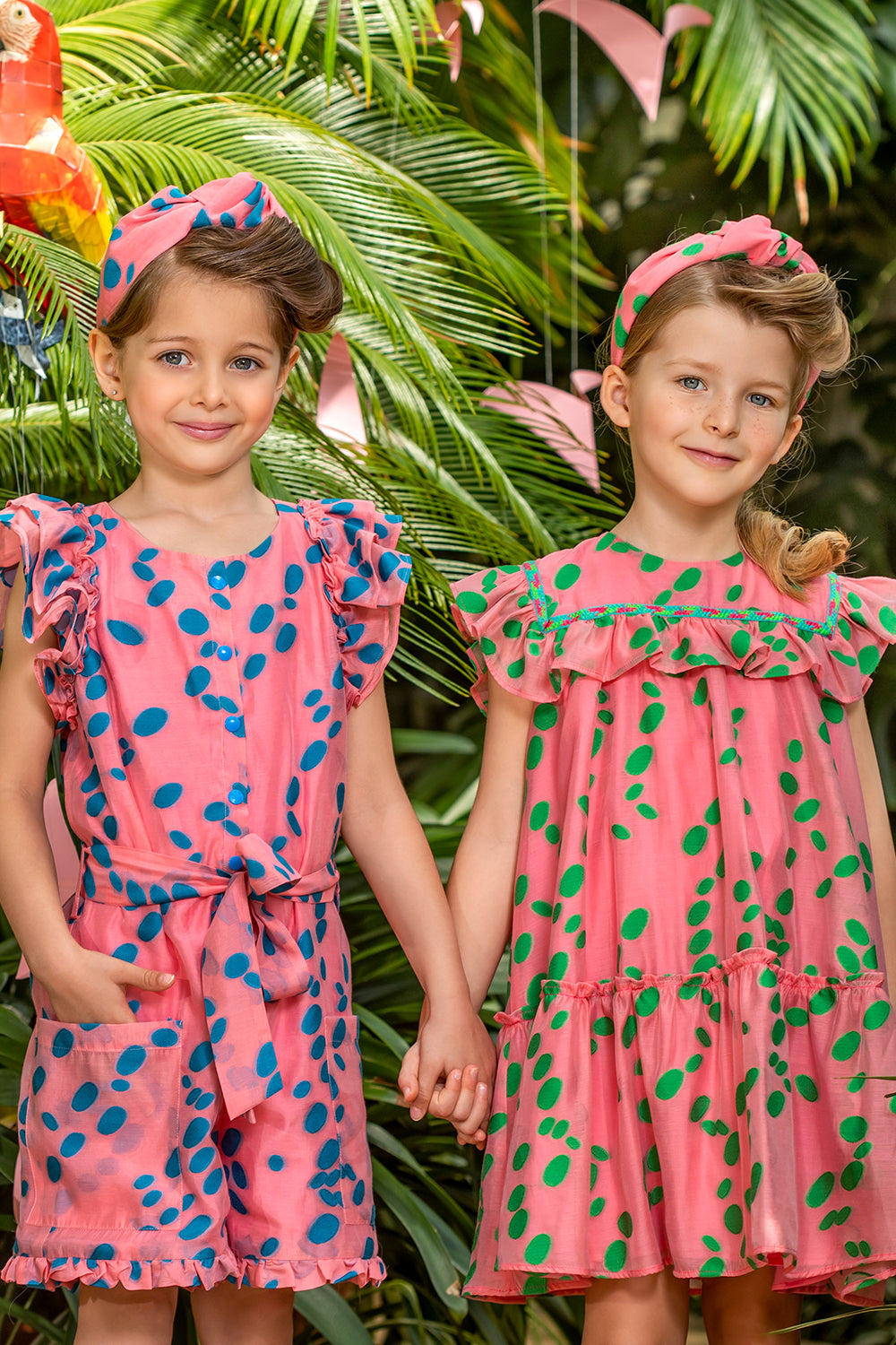 Coral viscose dress with green dots and frills