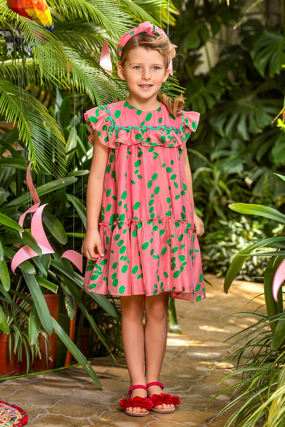 Coral viscose dress with green dots and frills
