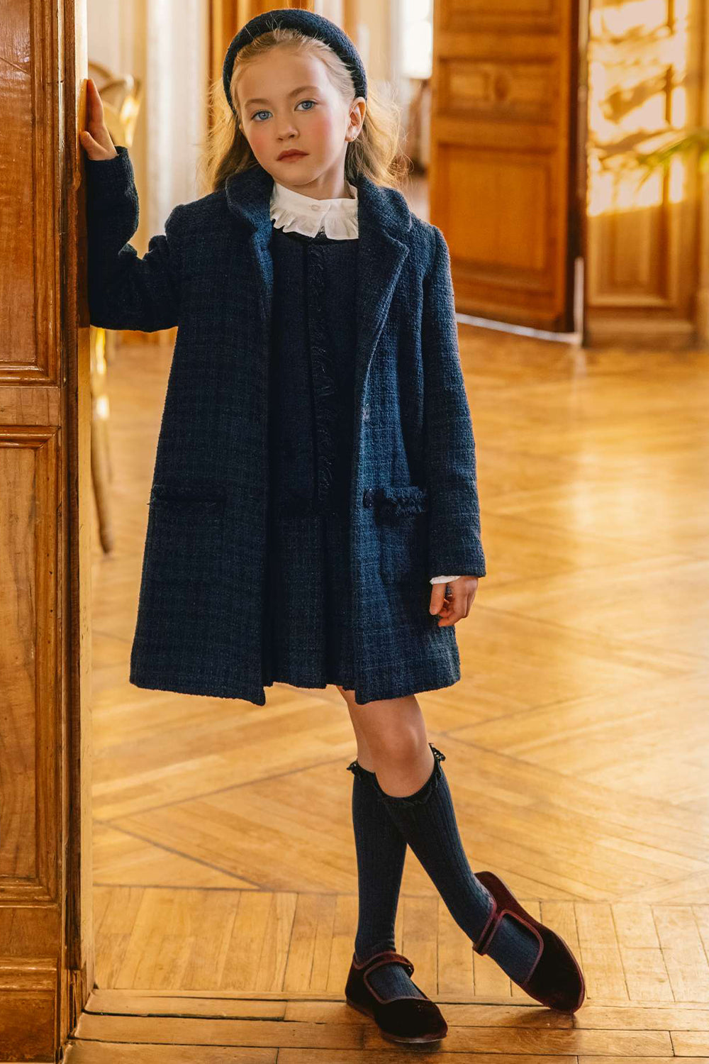 Blue tweed cotton blend coat with blue branded mother of pearl buttons