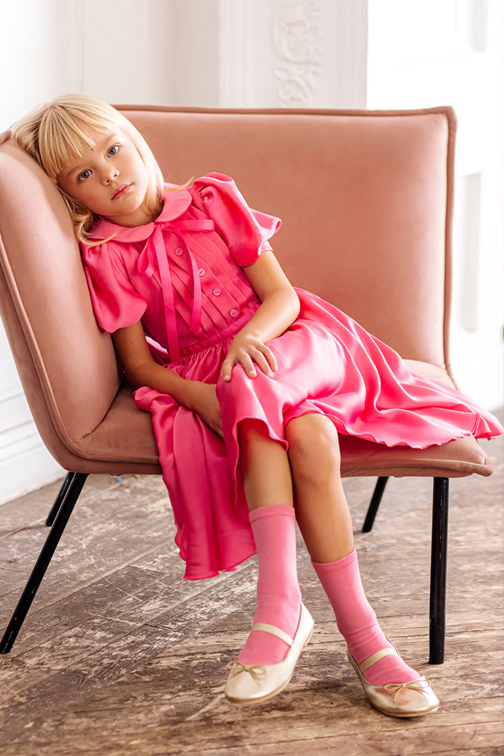 Coral satin dress with collar, front buttons and bow