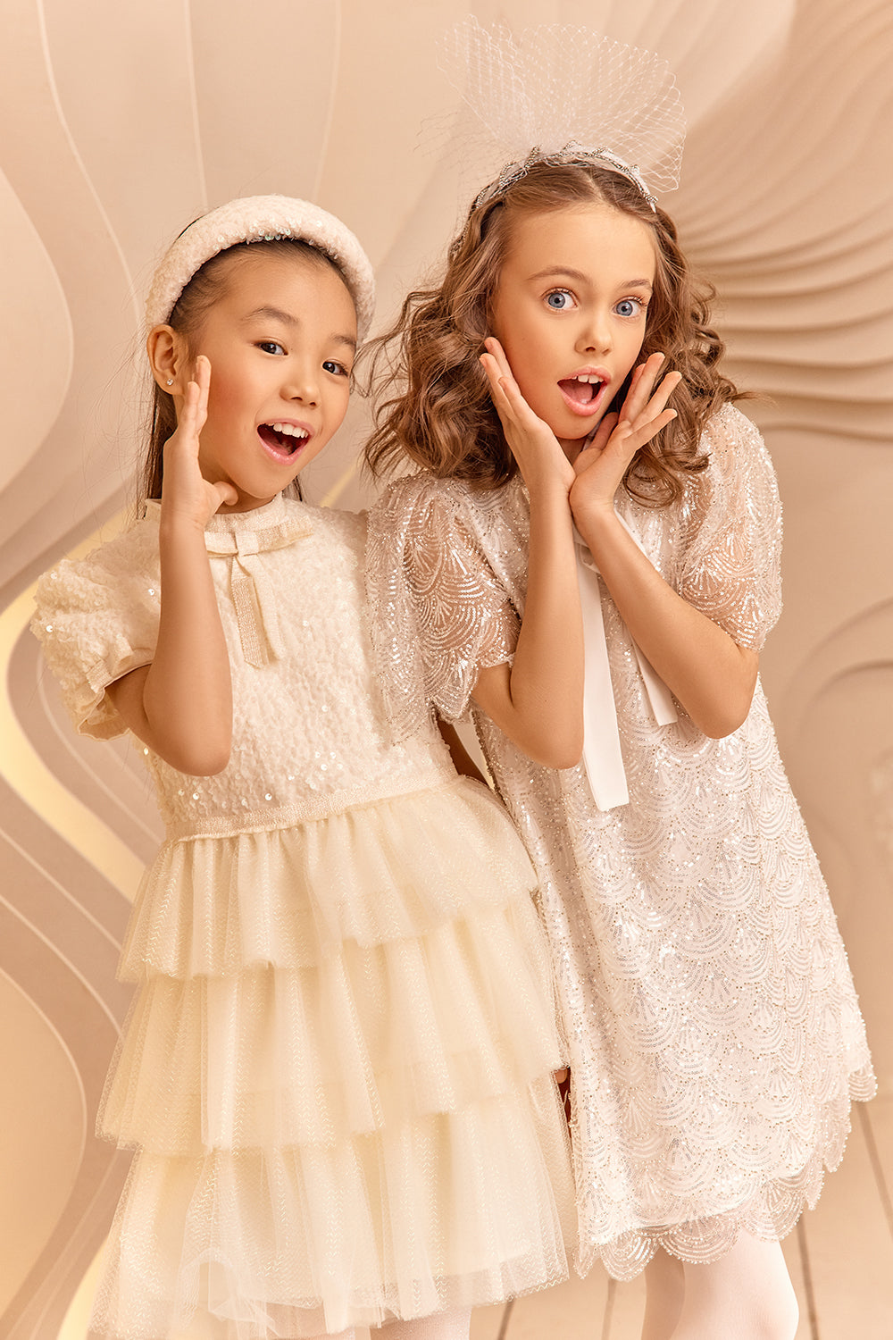 Ivory sequin and tulle glittery dress with bows