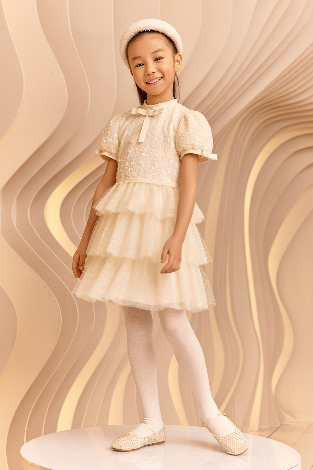 Ivory sequin and tulle glittery dress with bows