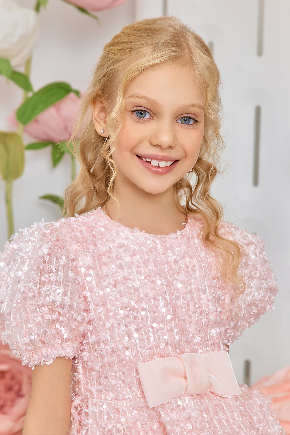 Pink sequin dress with velvet bow
