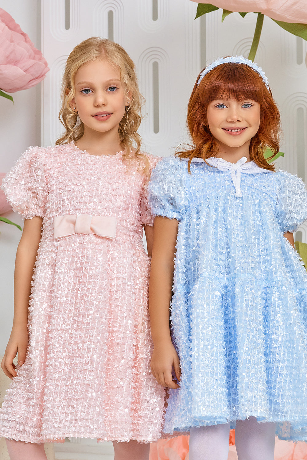 Pink sequin dress with velvet bow