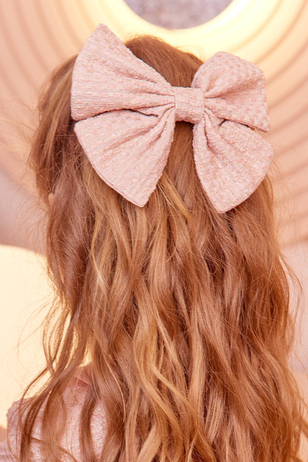 Pink and gold tweed hair bow
