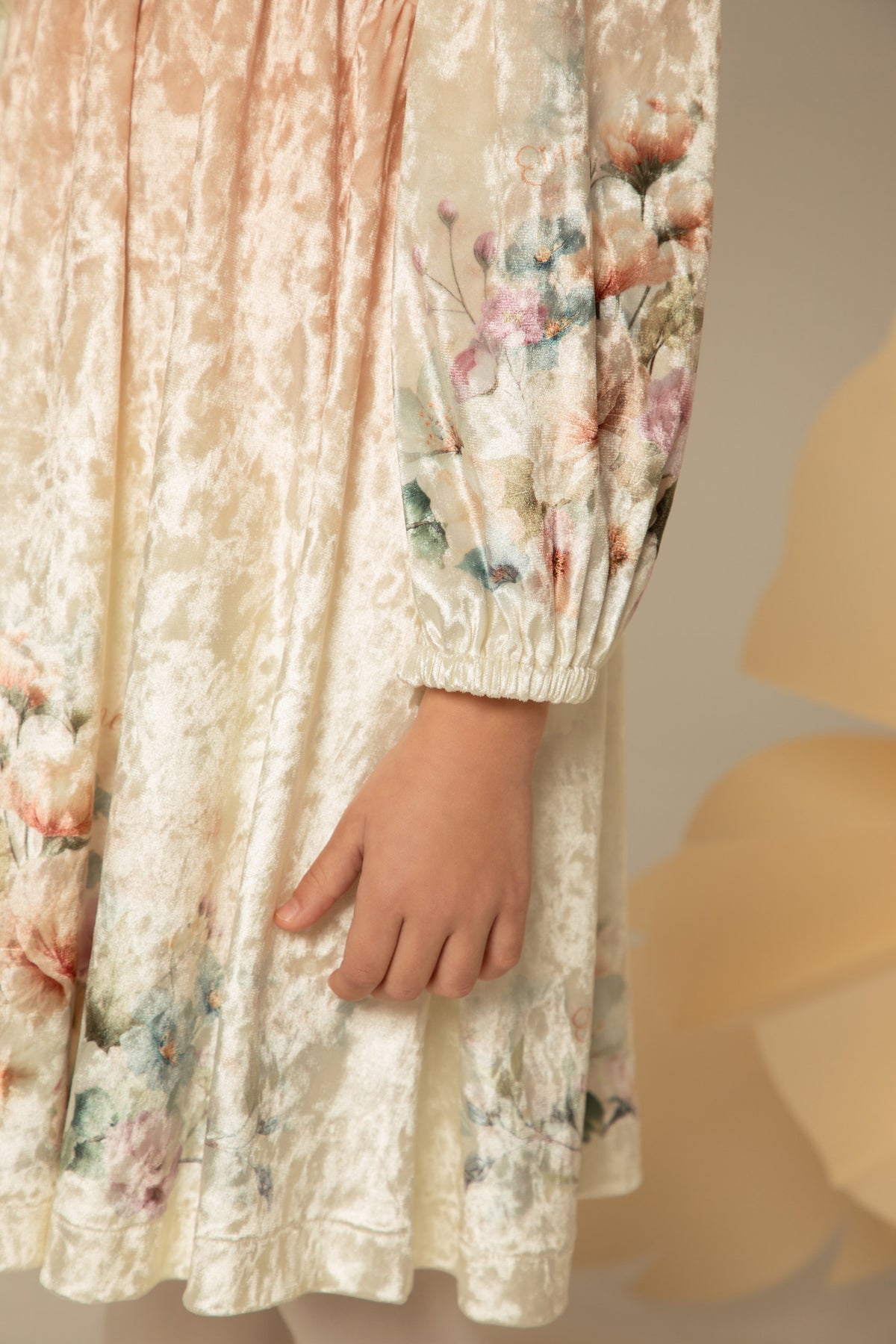 Detail of the velvet floral print at the hem