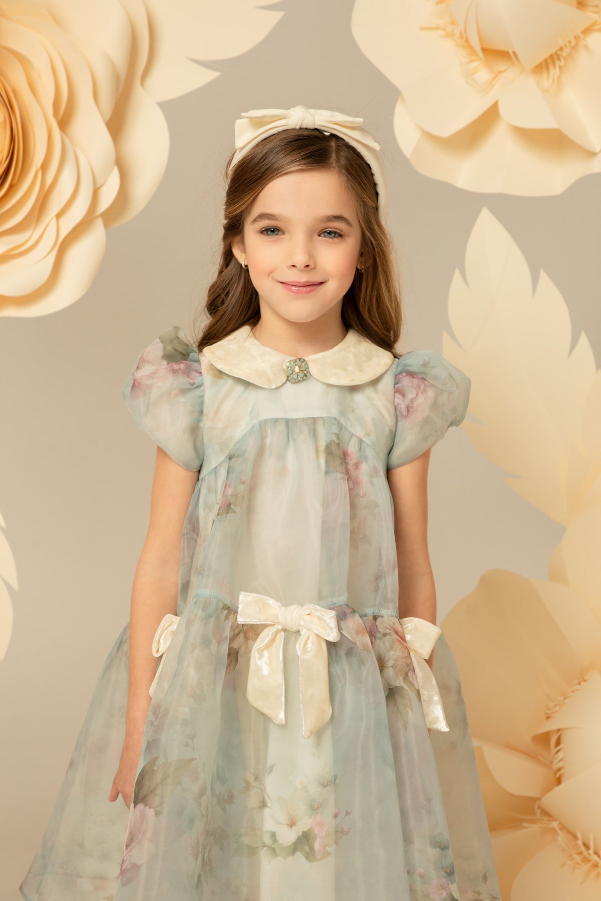 Pastel blue floral dress with puff sleeves and velvet collar