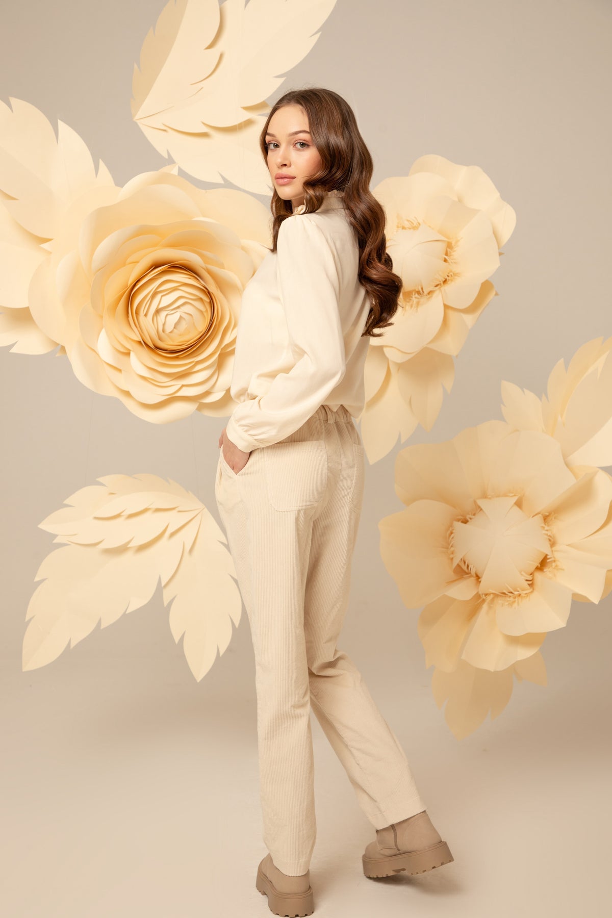 Back view of the cream viscose shirt