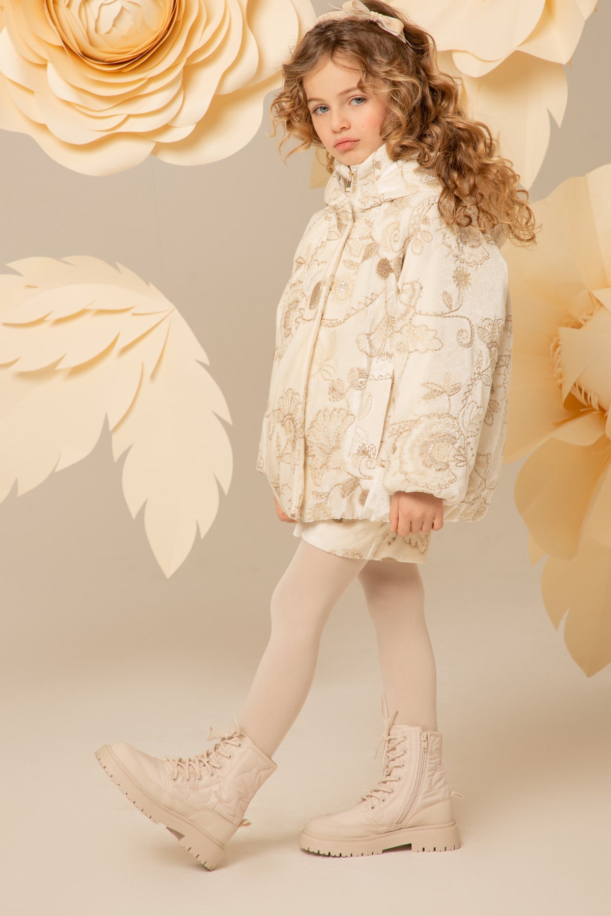 Ivory velvet coat with a hood and voluminous silhouette