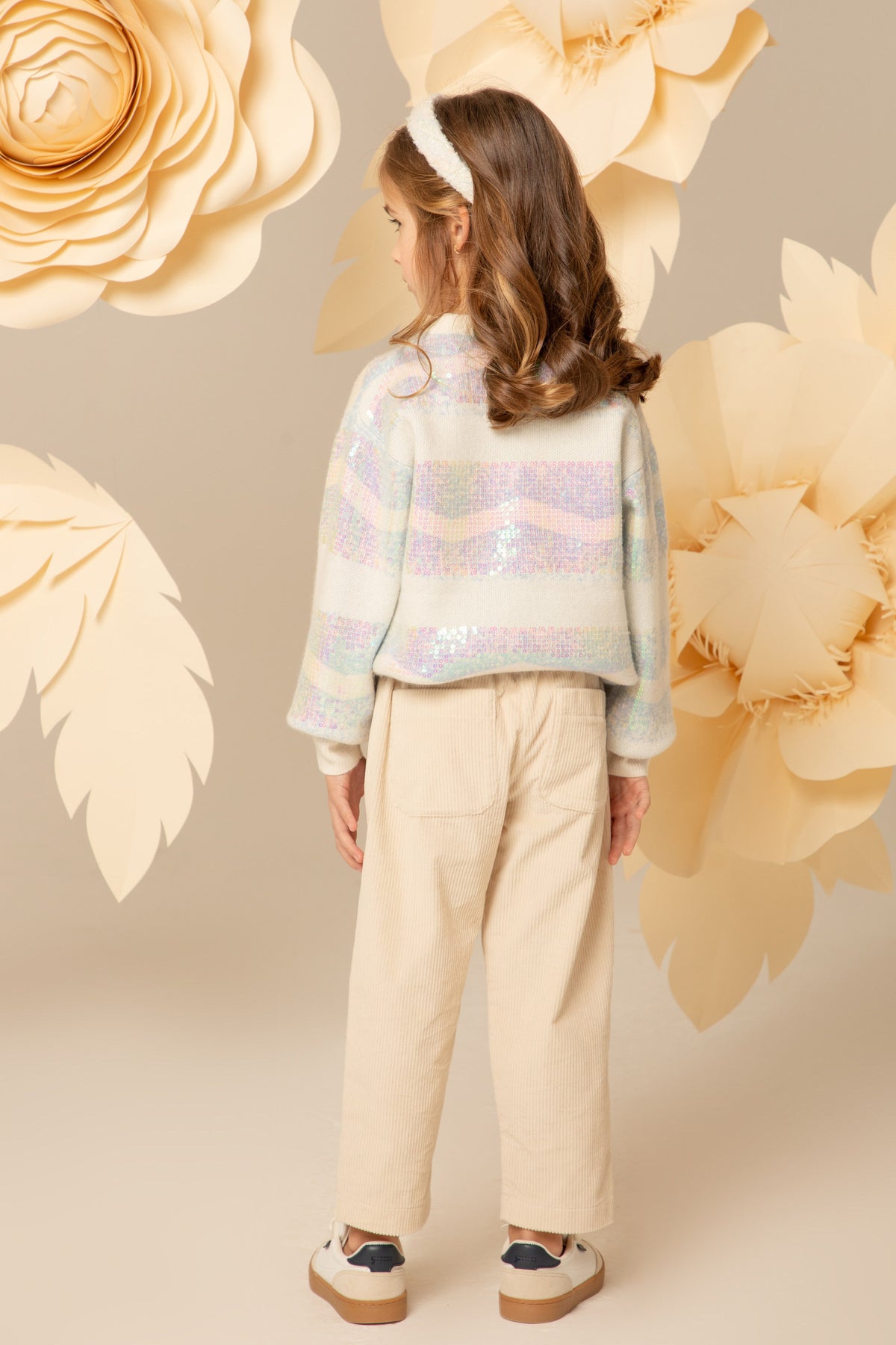 Back view of the oversized sequin sweater