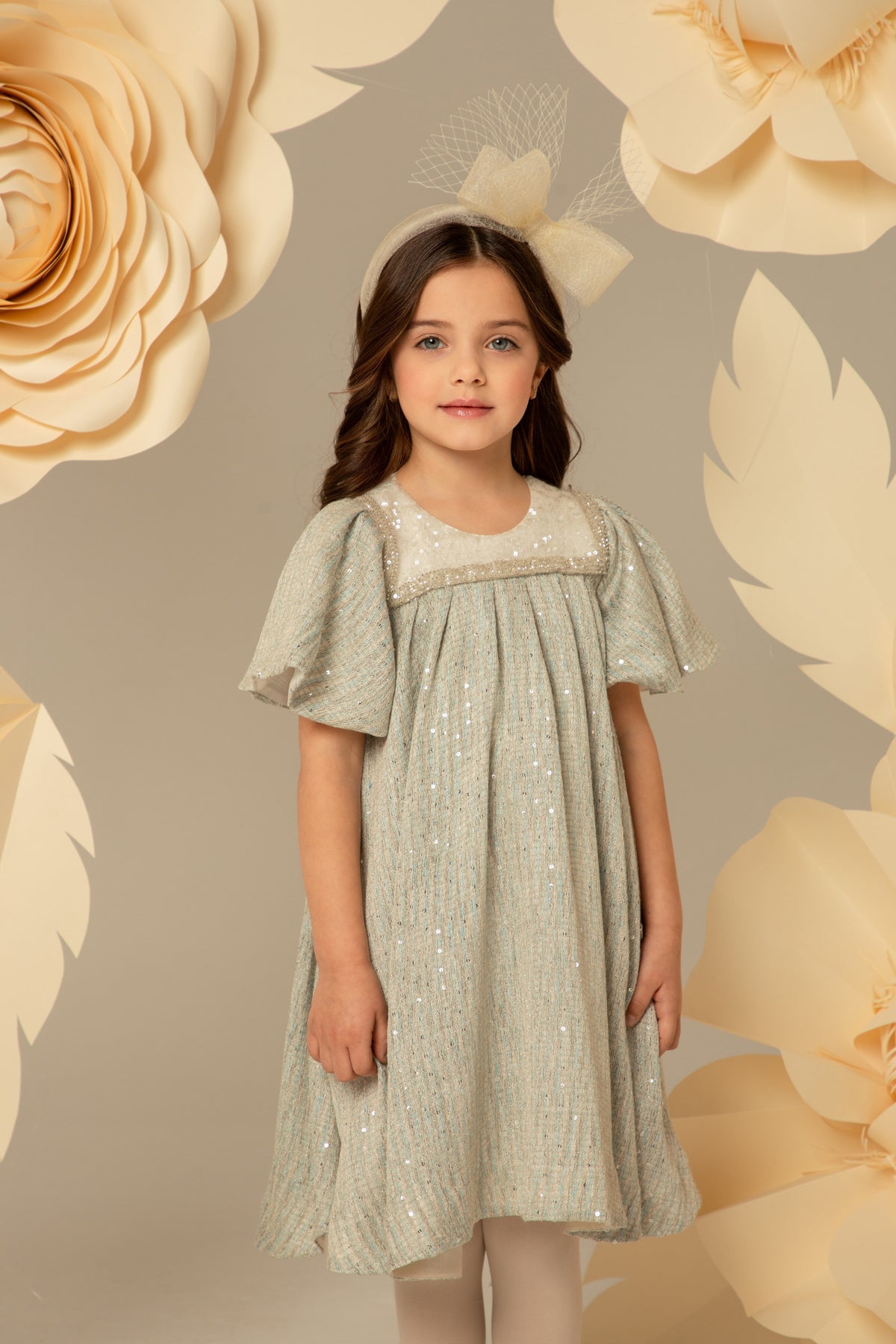 Blue shimmer dress with flutter sleeves