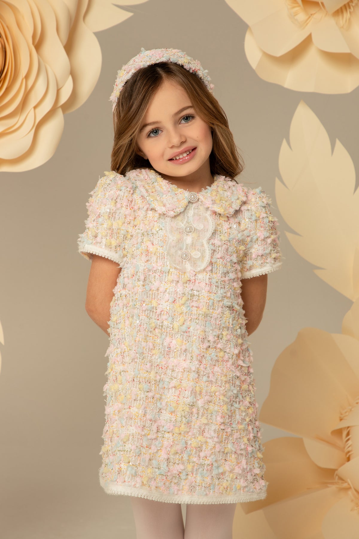 Pastel tweed dress with pearl buttons and short sleeves