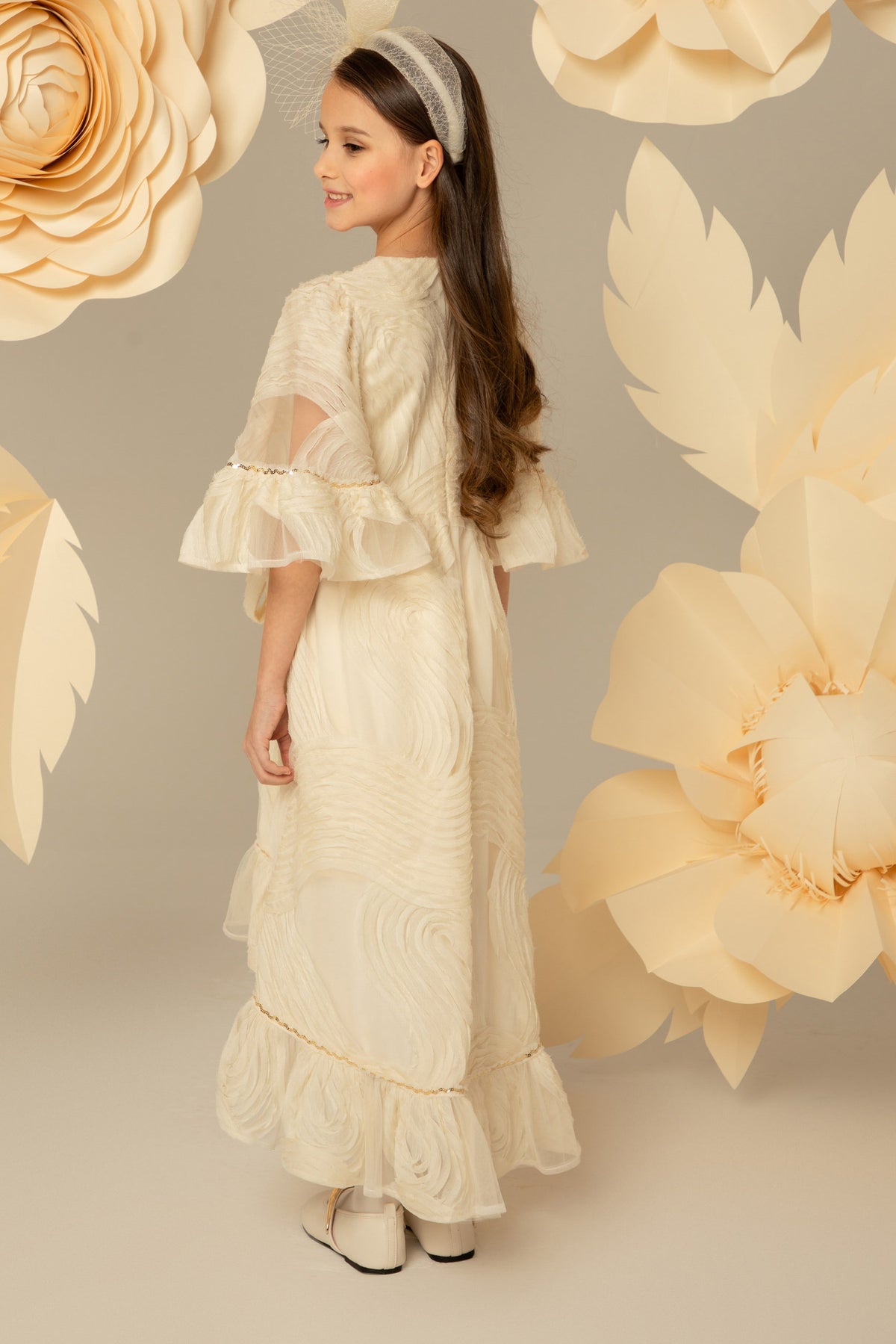 Side view of the tiered ivory chiffon skirt