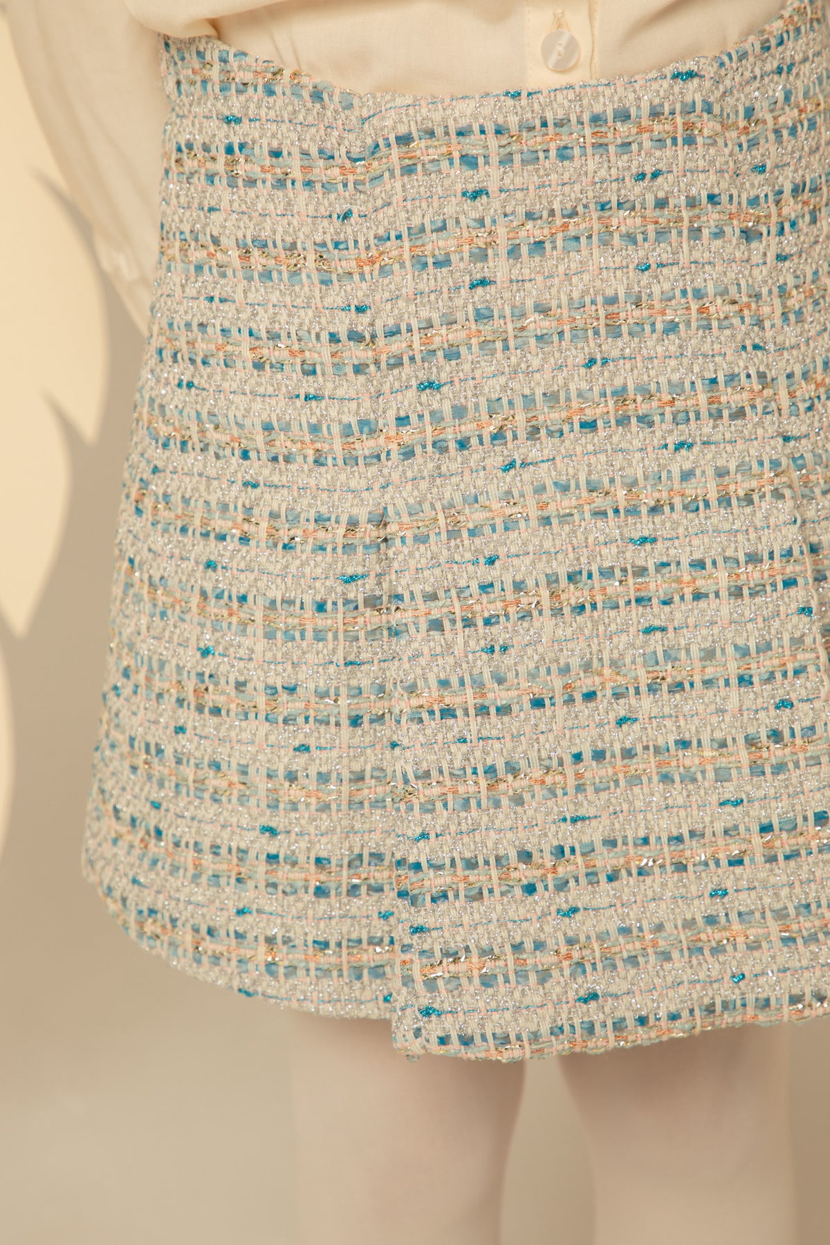 Detail of the tweed skirt
