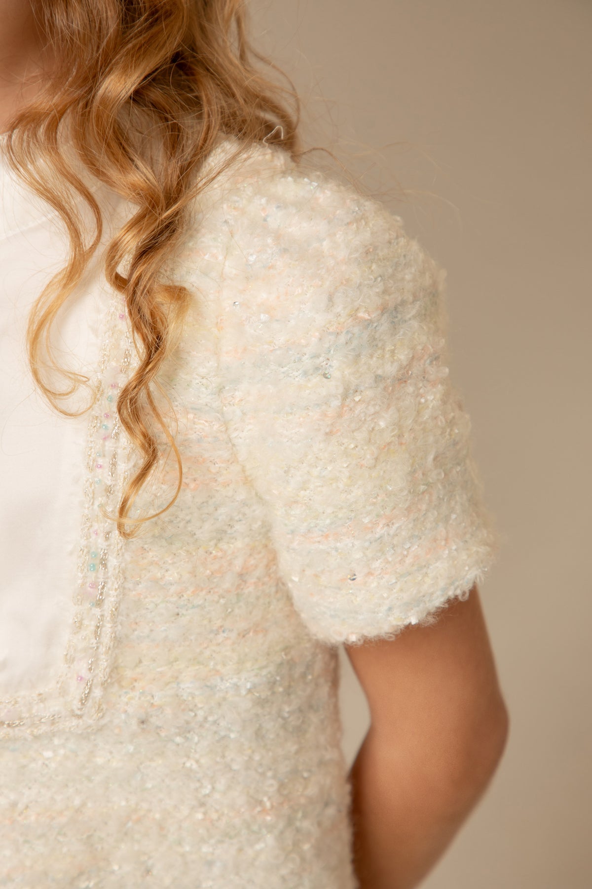 Detail of the pastel tweed sleeve