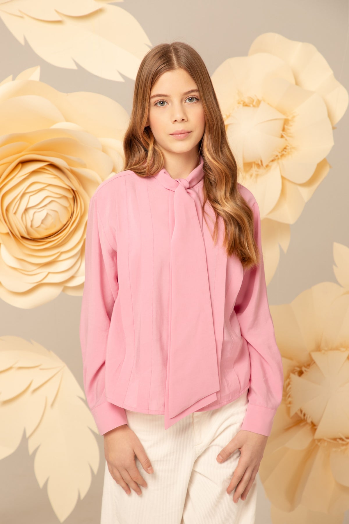 Pink blouse with fine vertical stitching