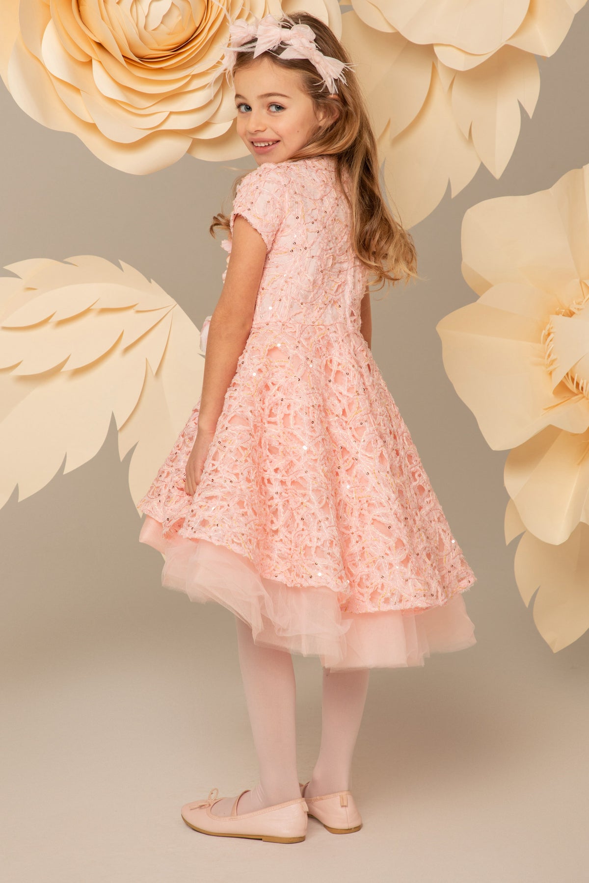 Back view of the pink lace and tulle dress