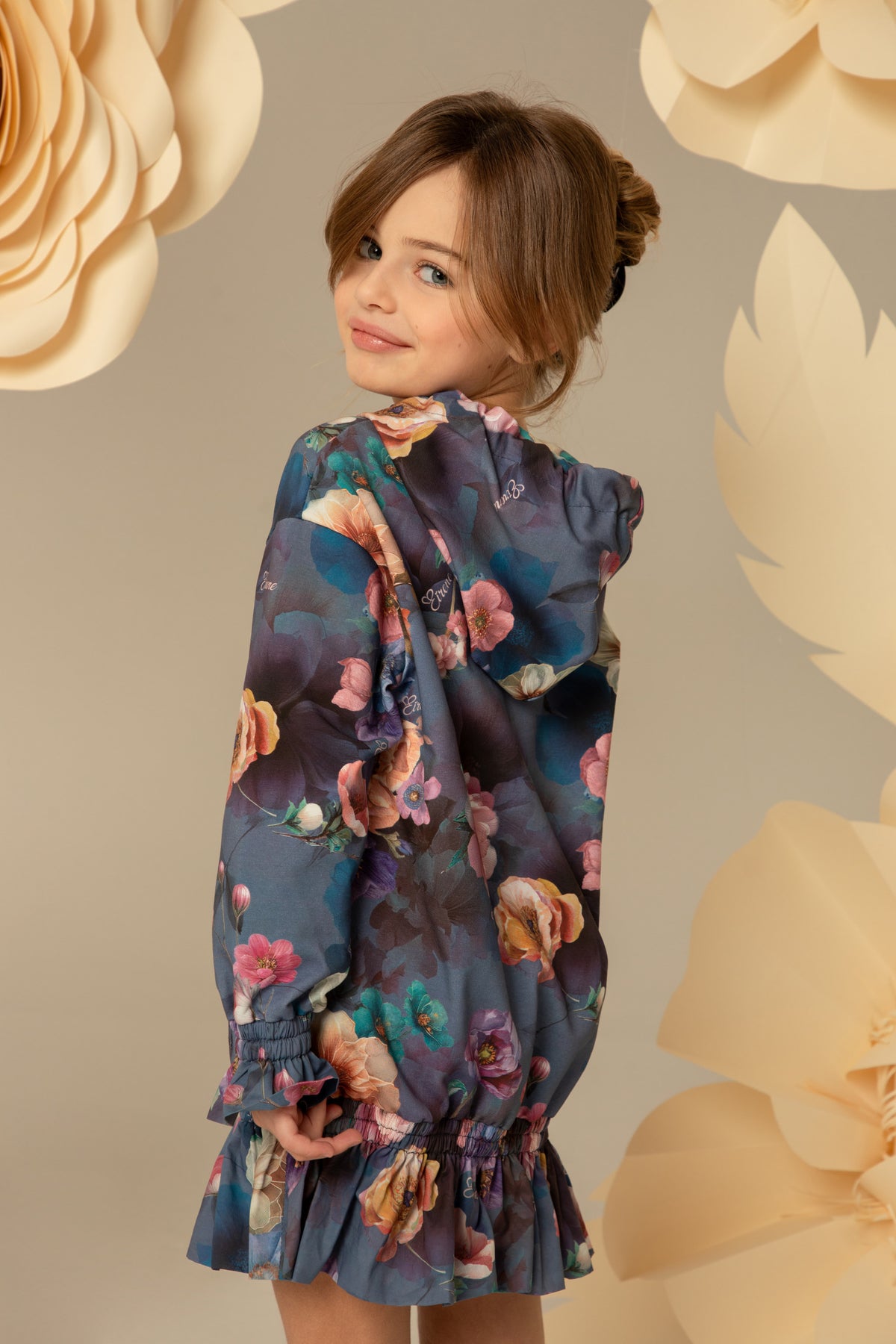 Side view of the ruffled hem on the tunic dress