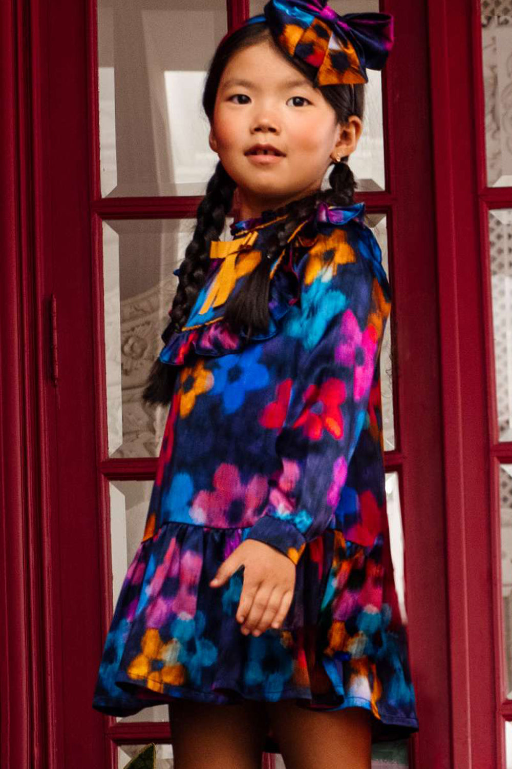 Ink blue blurred fuchsia, orange and blue flowers silk Liberty dress with orange bow