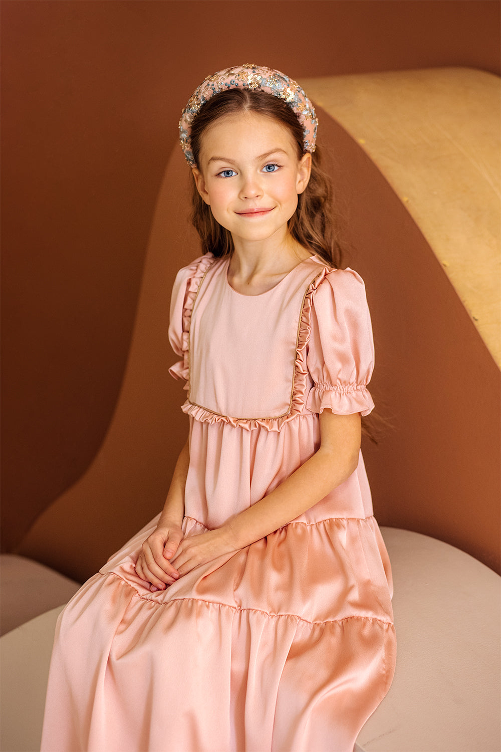 Long powder pink satin dress with frills