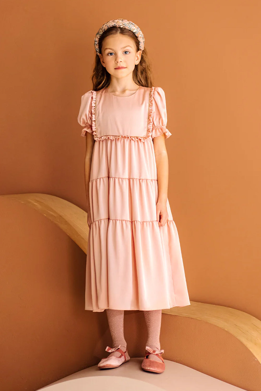 Long powder pink satin dress with frills