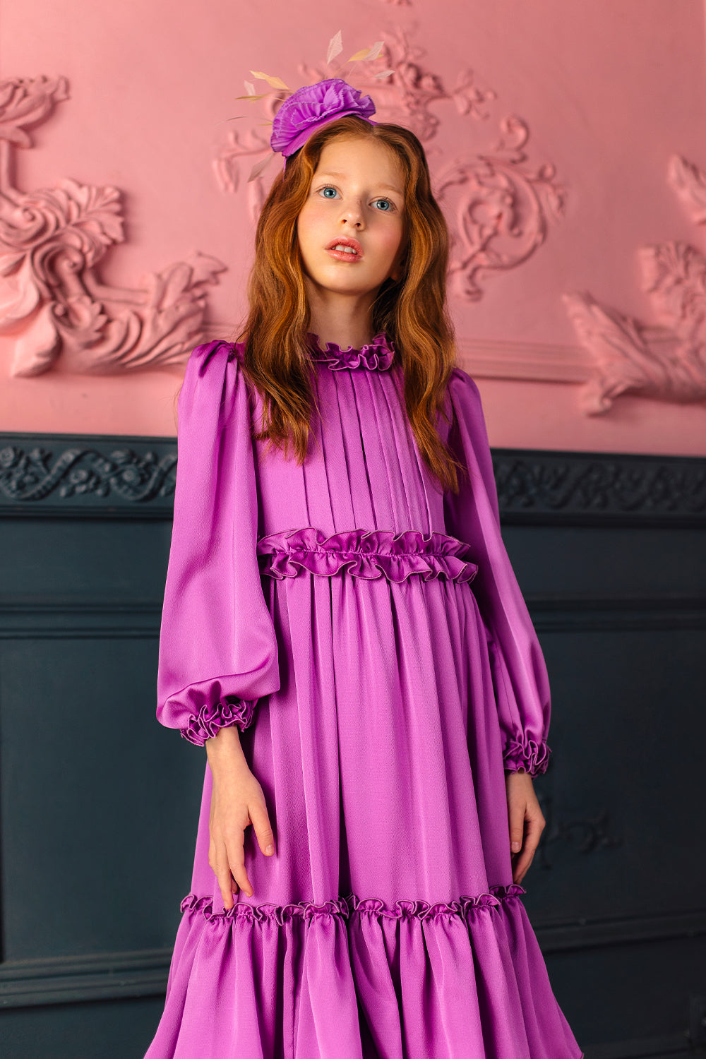 Long purple frilled dress with voluminous sleeves