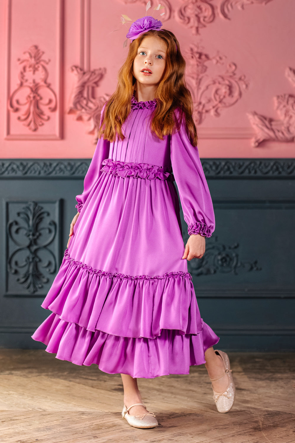 Long purple frilled dress with voluminous sleeves