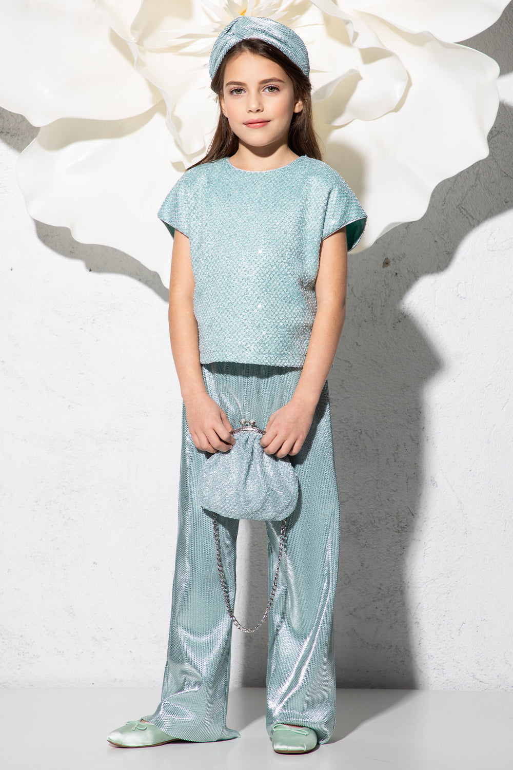 Mint jumpsuit with lace top and micro pleated bottom