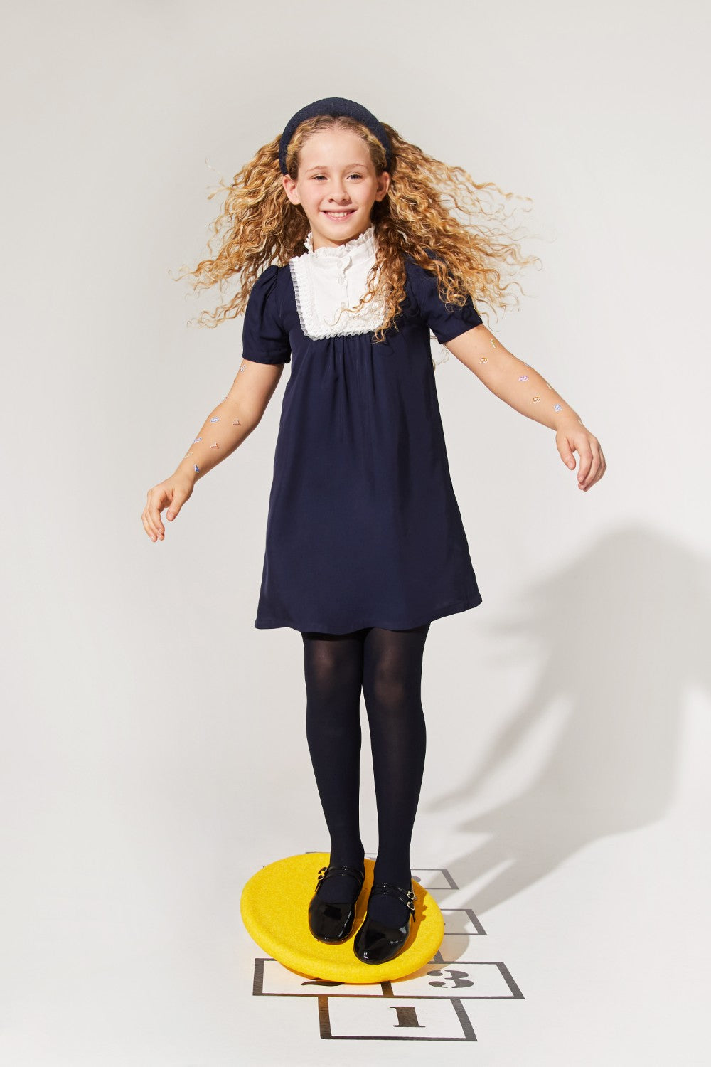 Blue woven viscose dress with white front detail, suitable for girls' special occasions.