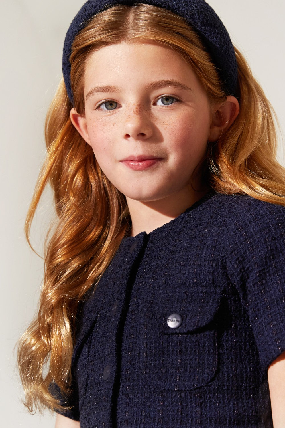 Blue tweed dress with buttons and pockets