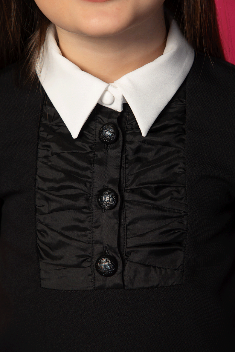 Black dress with white collar, front ruching and decorative buttons