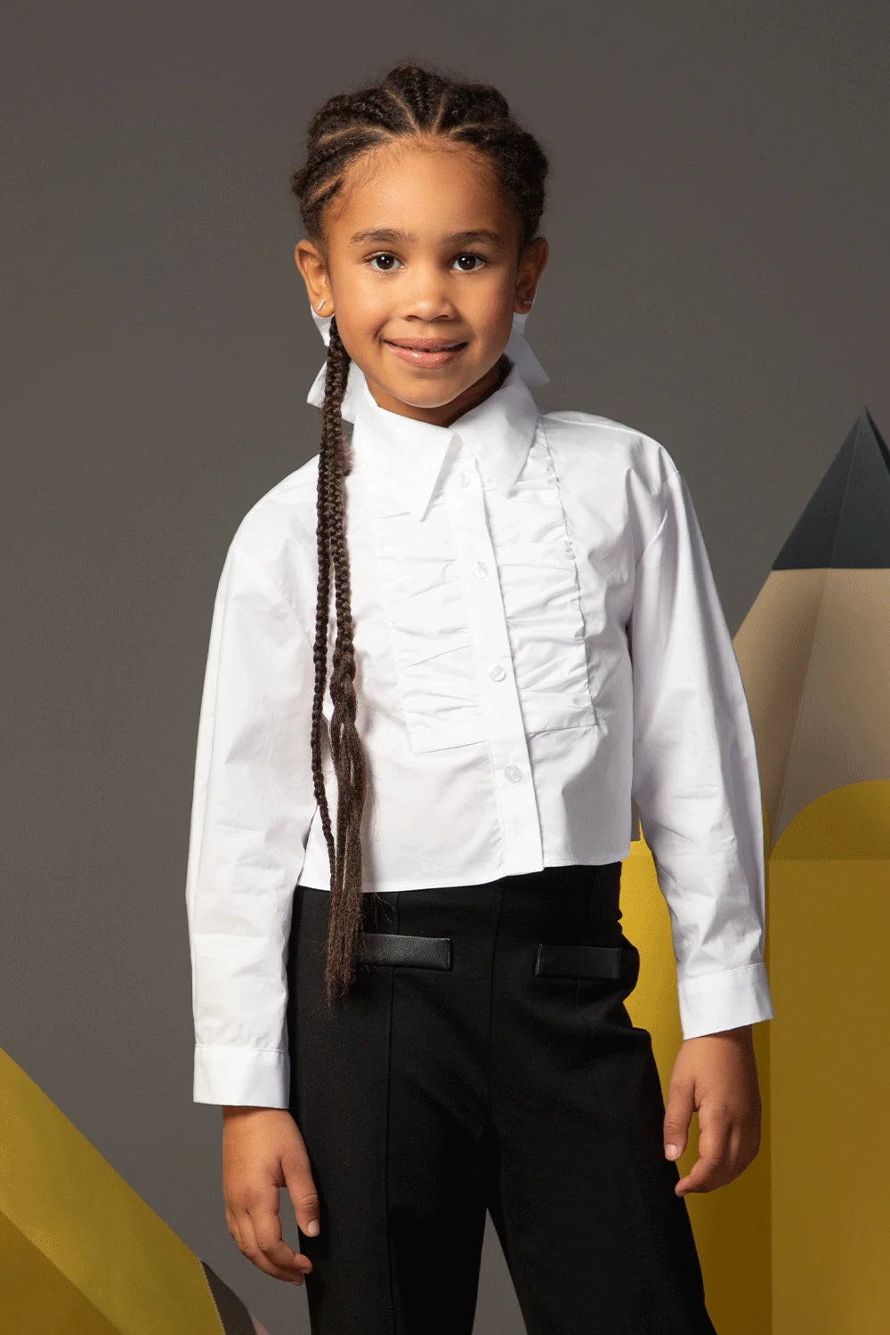 White cropped shirt with long sleeves, front ruffle and classic collar