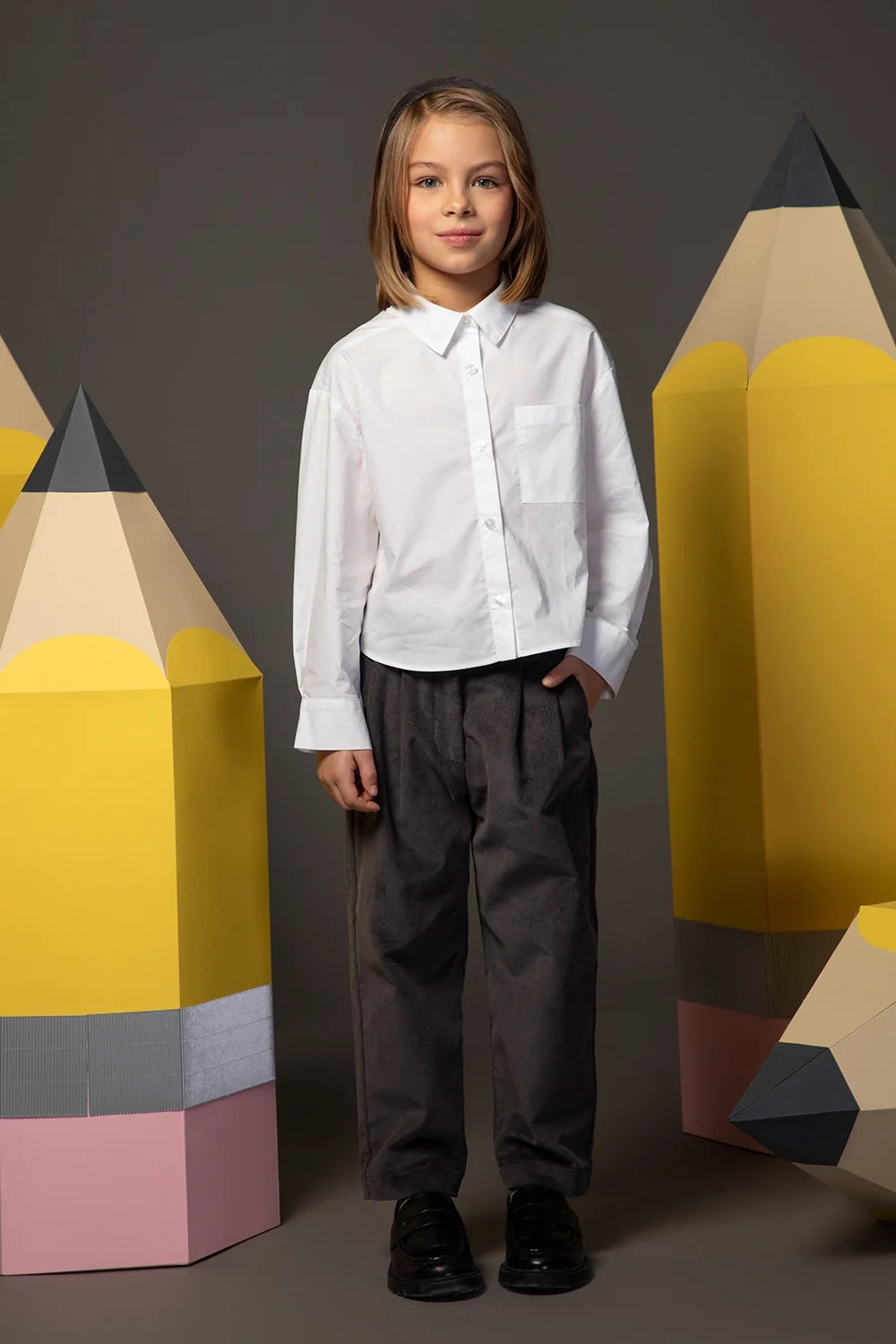 Relaxed grey corduroy trousers with front pleats