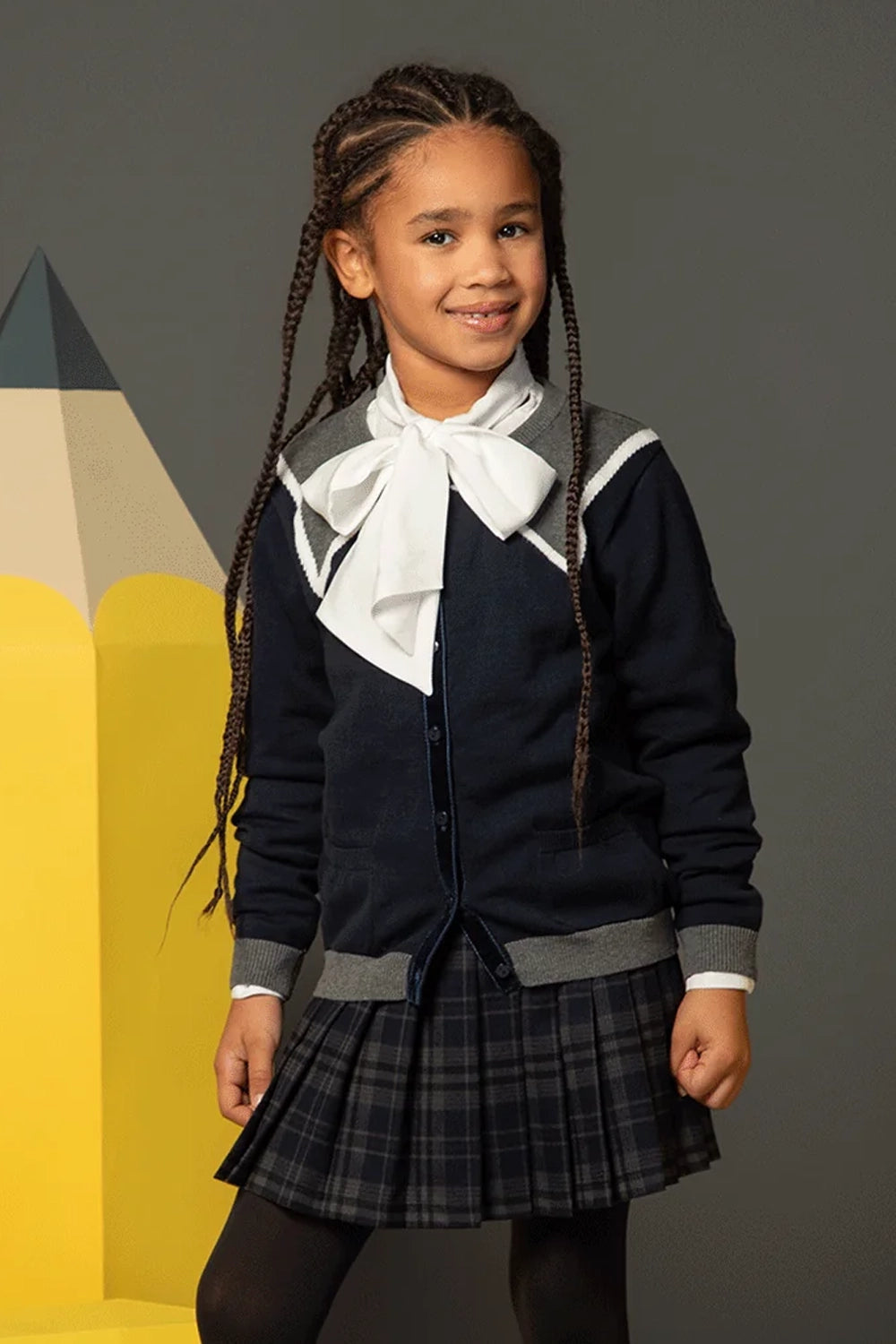 Navy cotton cardigan with grey trim, white details, buttons and pockets