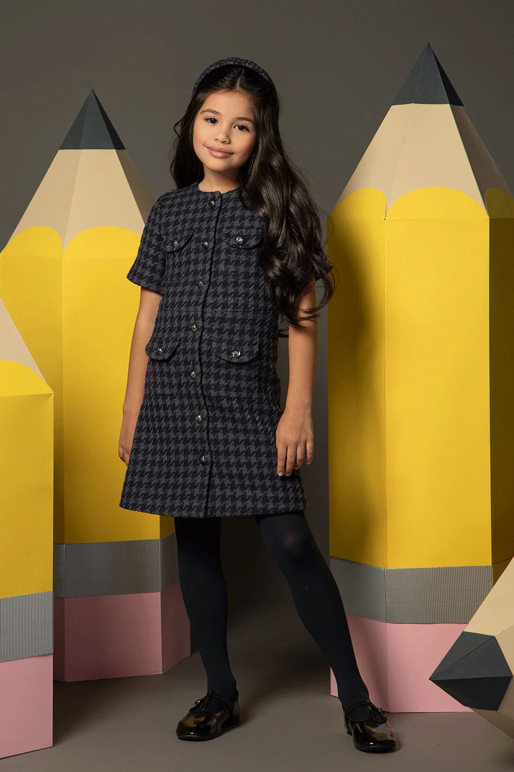 Elegant blue-grey checked dress with front buttons and pockets