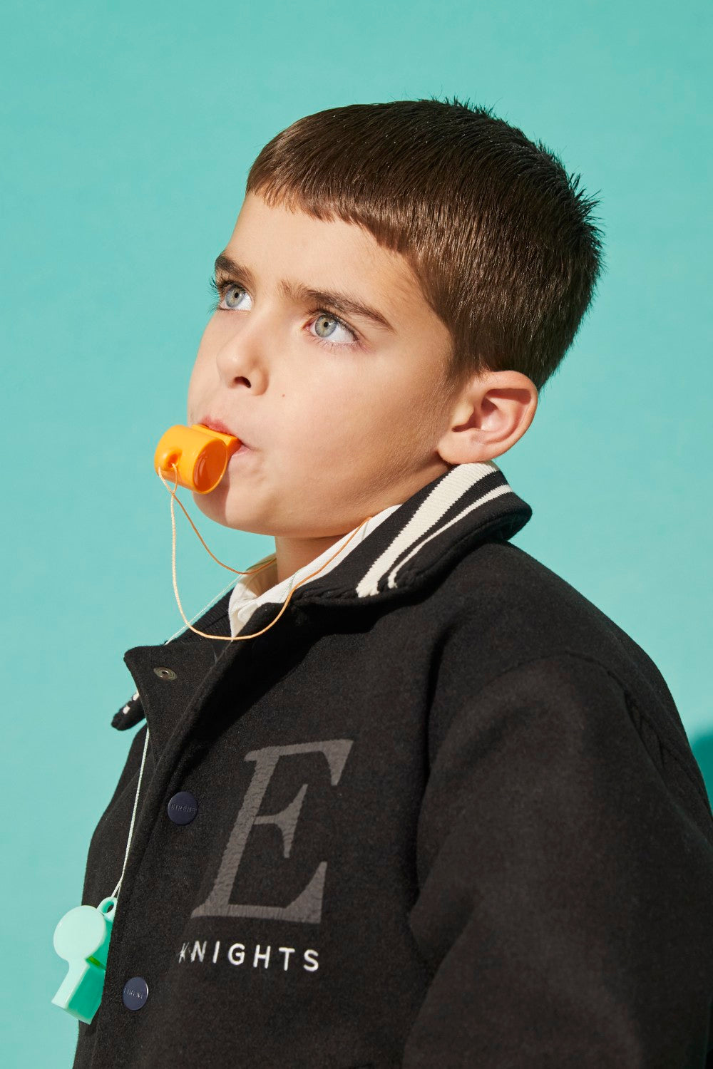 Black woven bomber jacket, 100% polyester, with a viscose blend lining, for children.