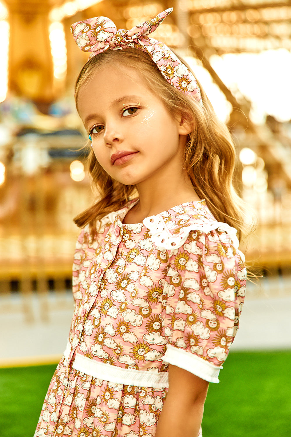 Pink and white Sun and Clouds cotton Liberty print dress with puffed sleeves
