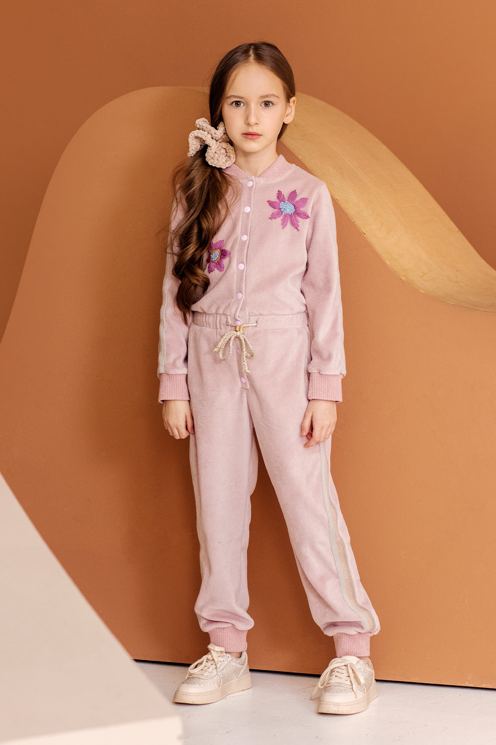 Pink cotton velvet jumpsuit with lurex stripes and hand-made flower embroidery