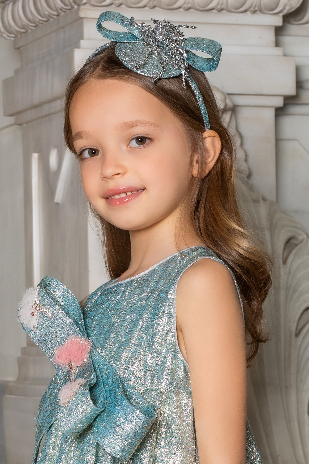 Blue shimmering headband with silver decoration
